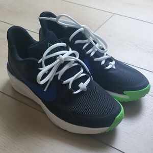 Nike Black Sneakers with Blue Swoosh and Green Accents